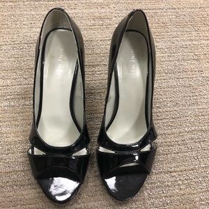 Nine West black patent pumps
